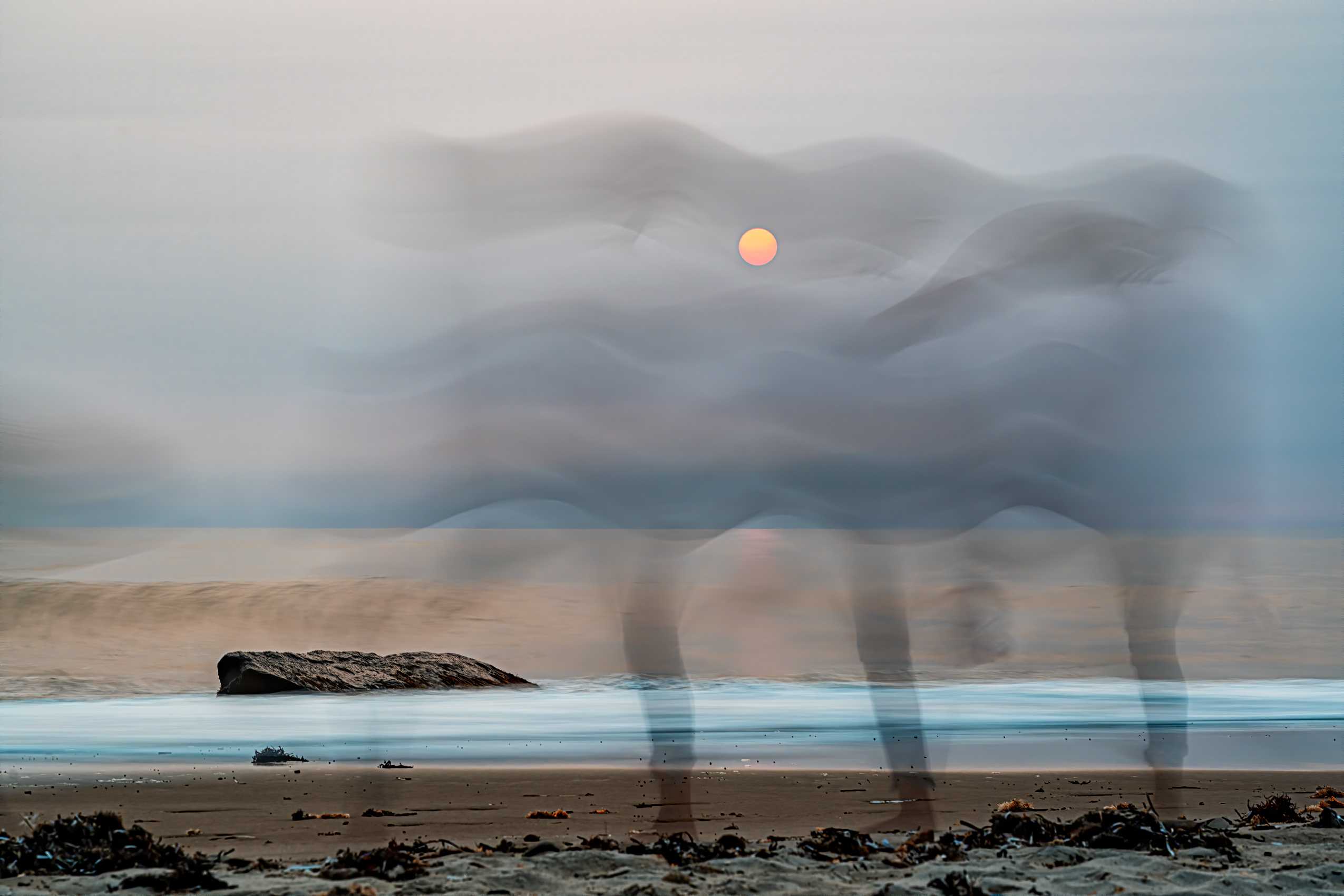 Photographing sunset at the beach is routine, except this pandemic year. A hand-held long exposure captured an eerie moment. State Of Flux, Sunset Ghost 1, Martha's Vineyard