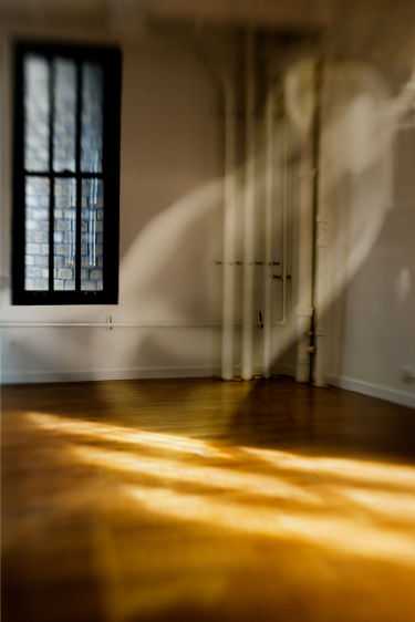 Reflecting the economic downturn, a empty Chelsea gallery is filled with ghostly light, perhaps of abandoned artists. 2008 Gallery Ghost, New York City