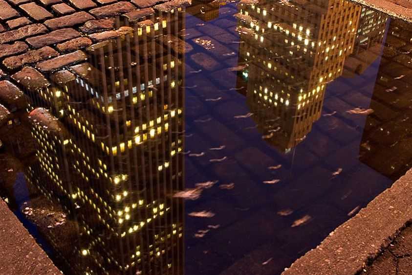 Twilight reflections at the Fifth Avenue entrance to Central Park. The City Below, New York City, 2005