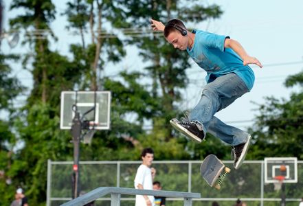 skateboarder getting air at skatepark in Beverly