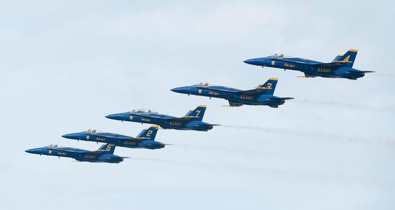 Blue Angels flying F-18 Superhornets in line formation