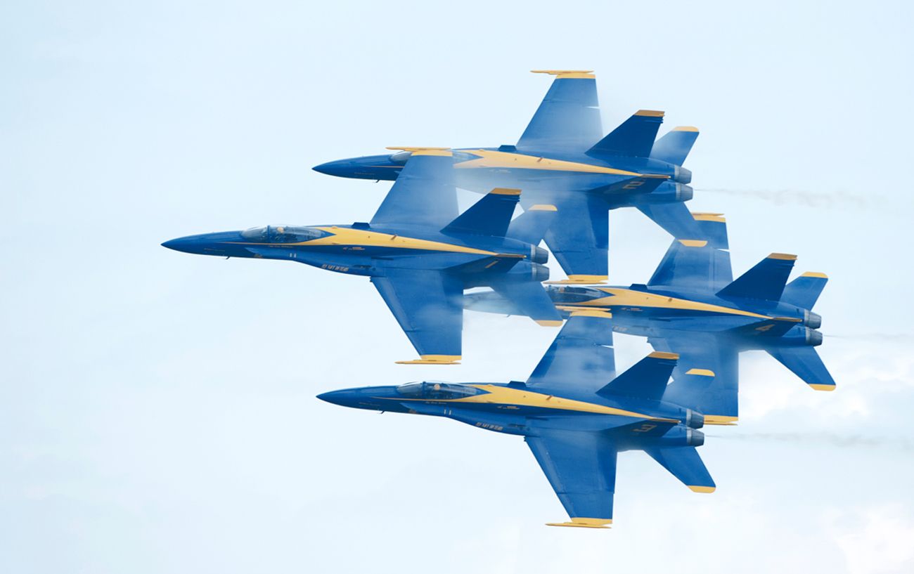 Blue Angels F-18 Superhornets doing high speed maneuvers