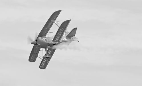 Oracle acrobatic biplane piloted by Sean Tucker - B&W