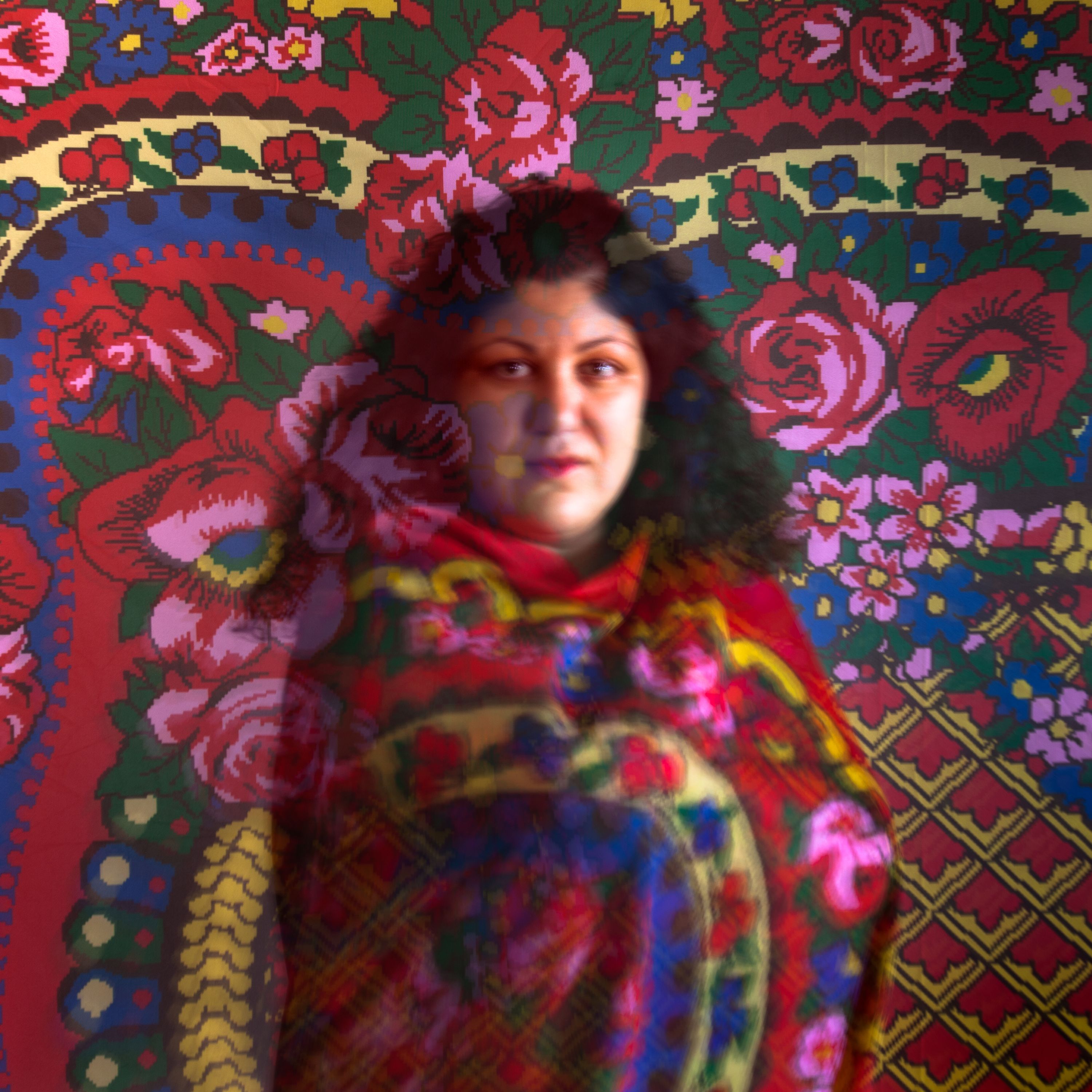 Emilia Rigová with the fabric she designed based on a Romani scarf