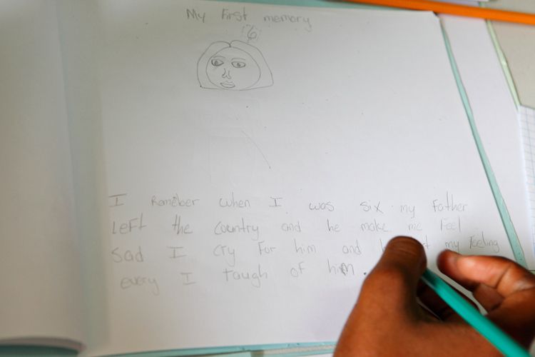 A Teenager participates in Michelle Anderson's child care group session for young people to express through drawing and writing their feelings of anger, sadness, happiness, frustration. Georgetown, Guyana. 1guyana_children_poverty.jpg