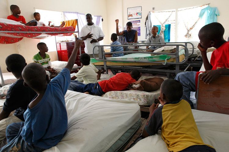 Georgetown Residential centre for Children. The Boys Dormitory.Children come to the centre for a variety of reasons, usually sexual or physical violence at home, occasionally at a Parents direct request for help. Mark Job (Centre) who manages the centre and works for EveryChild “In terms of the manifestation of behaviour it is quite ugly as by virtue of these children experiences sexual abuse, physical abuse, abandonment and neglect you have rebelliousness, you have arrogance, you have disrespect for authority. Fighting, the use of indecent language loosely and freely, lying and stealing – so you have all kinds of ugly social manifestations in the behaviour. So its times like that that you understand the issues, the challenges, and help them to find alternative ways of expressing their anger, betrayal and confusion rather than lashing out’ Georgetown, Guyana. 1childrens_home_guyana.jpg