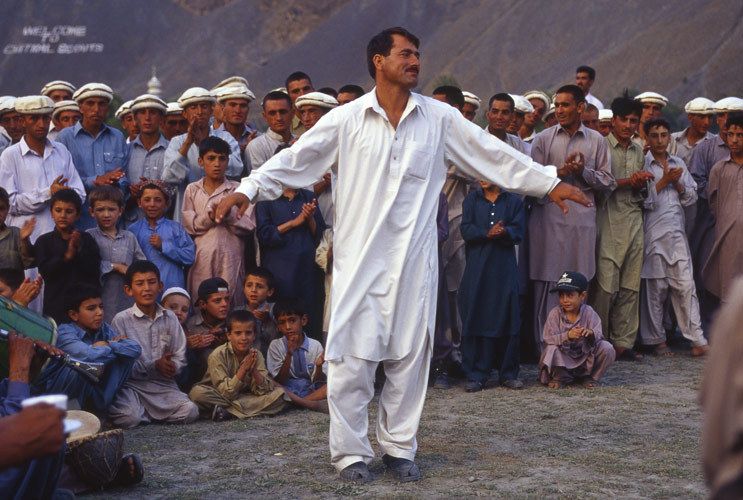 Captain of the winning Polo team dances in celebration. Chitral, Pakistan. 1pakistan_chitral_polo_08.jpg