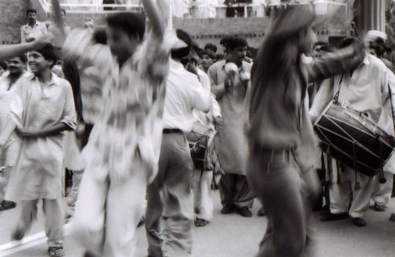 Men Dancing at closing of the border ceremony. Lahore gates, Pakistan. 1pakistan_lahore_border_18.jpg