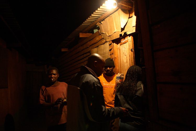 Staff from the Chisomo Street Children project in Lilongwe, Malawi look for children sleeping rough on shop Verandahs, Markets, alleys,anywhere. Once found the young people are invited to visit Chisomo for food, a wash, support and counselling. 1malawi_street_children_10.jpg