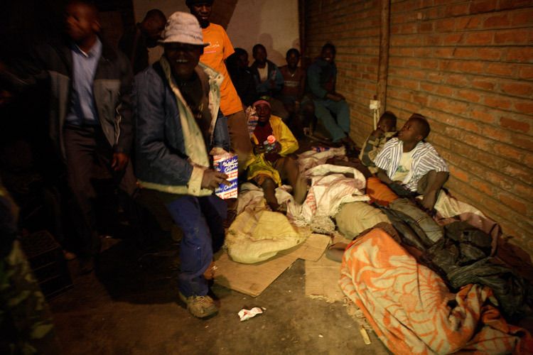 Staff from the Chisomo Street Children project in Lilongwe, Malawi look for children sleeping rough on shop Verandahs, Markets, alleys,anywhere. Once found the young people are invited to visit Chisomo for food, a wash, support and counselling. 1malawi_street_children_12.jpg
