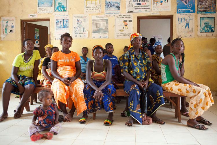 Pregnant women wait for their midwife checks in a rural health centre. Sierra Leone for VSO. 1sierra_leone_women_health_4.jpg