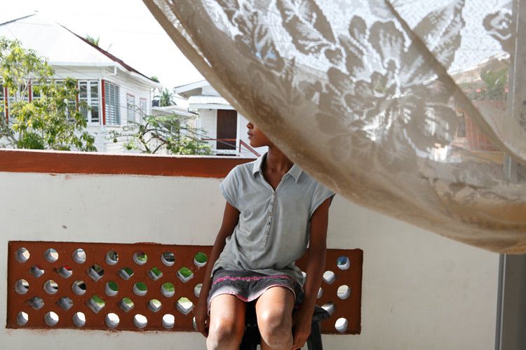 Yolande 9 years old, was abused by her Stepfather. She previously lived with her mother who was a drug addict and her older brother Mark, 13. Yolande's Grandmother was so concerned about the children she notified social services who placed them in a Children’s home. With the help of EveryChild both children are now living safely with their grandmother. Georgetown, Guyana. 1guyana_child_buse_9.jpg