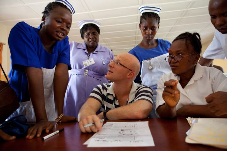VSO Doctor Alex Burns works with Nurses, Midwives and Nursing Assistants to realise the potential for saving lives through using the partograph during a womans labour. Makeni Hospital, Sierra Leone. 1partograph_sierra_leone.jpg