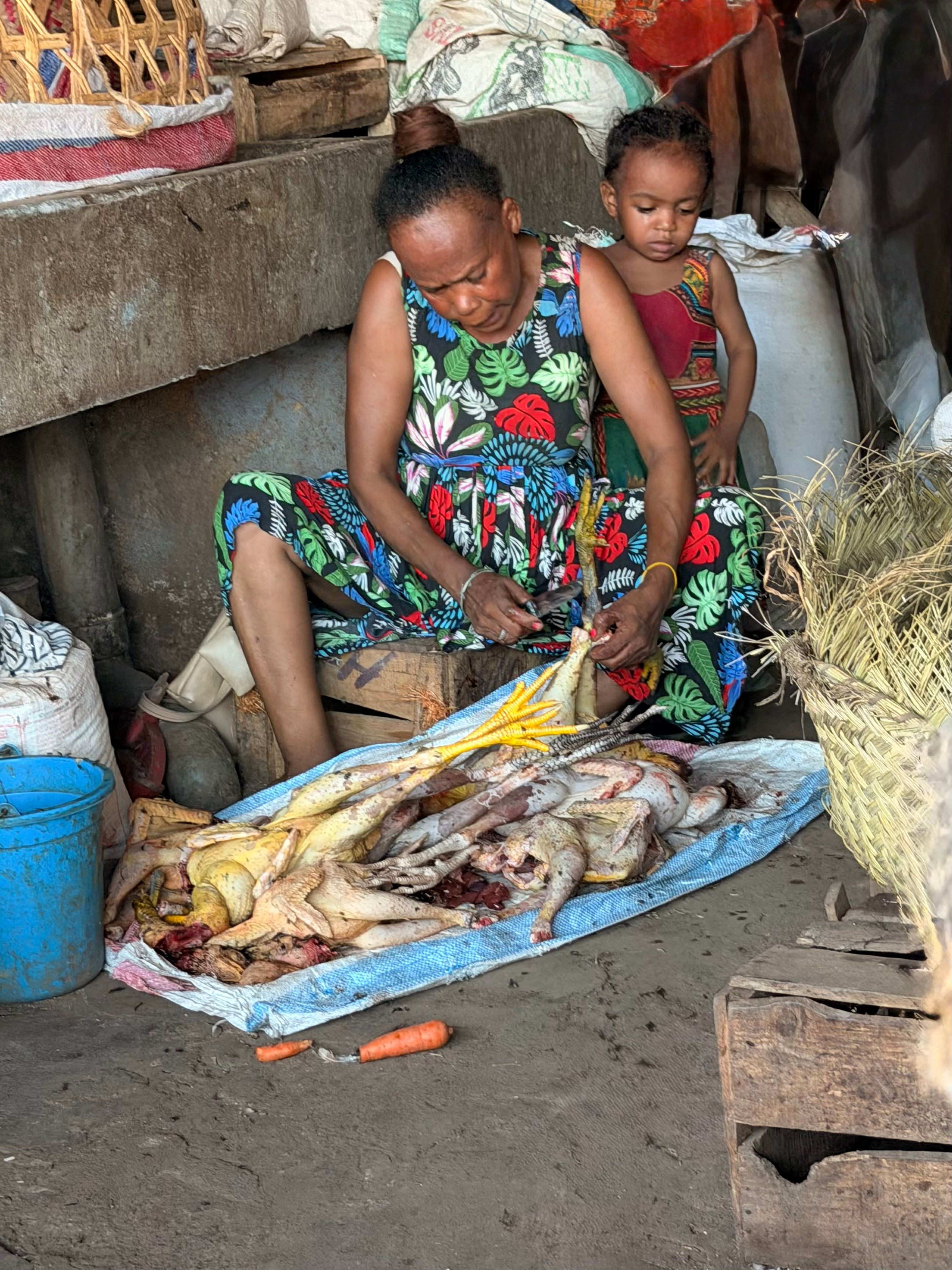 Market stripping chicken.jpeg