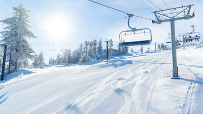 Snow Valley ski and snowboard resort after a fresh snow. Ski Lift at Snow Valley