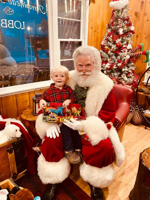 Santa in Arrowhead Pine Rose Cabins