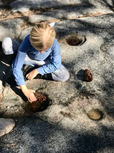Girl, l into the Metate The indian Metates