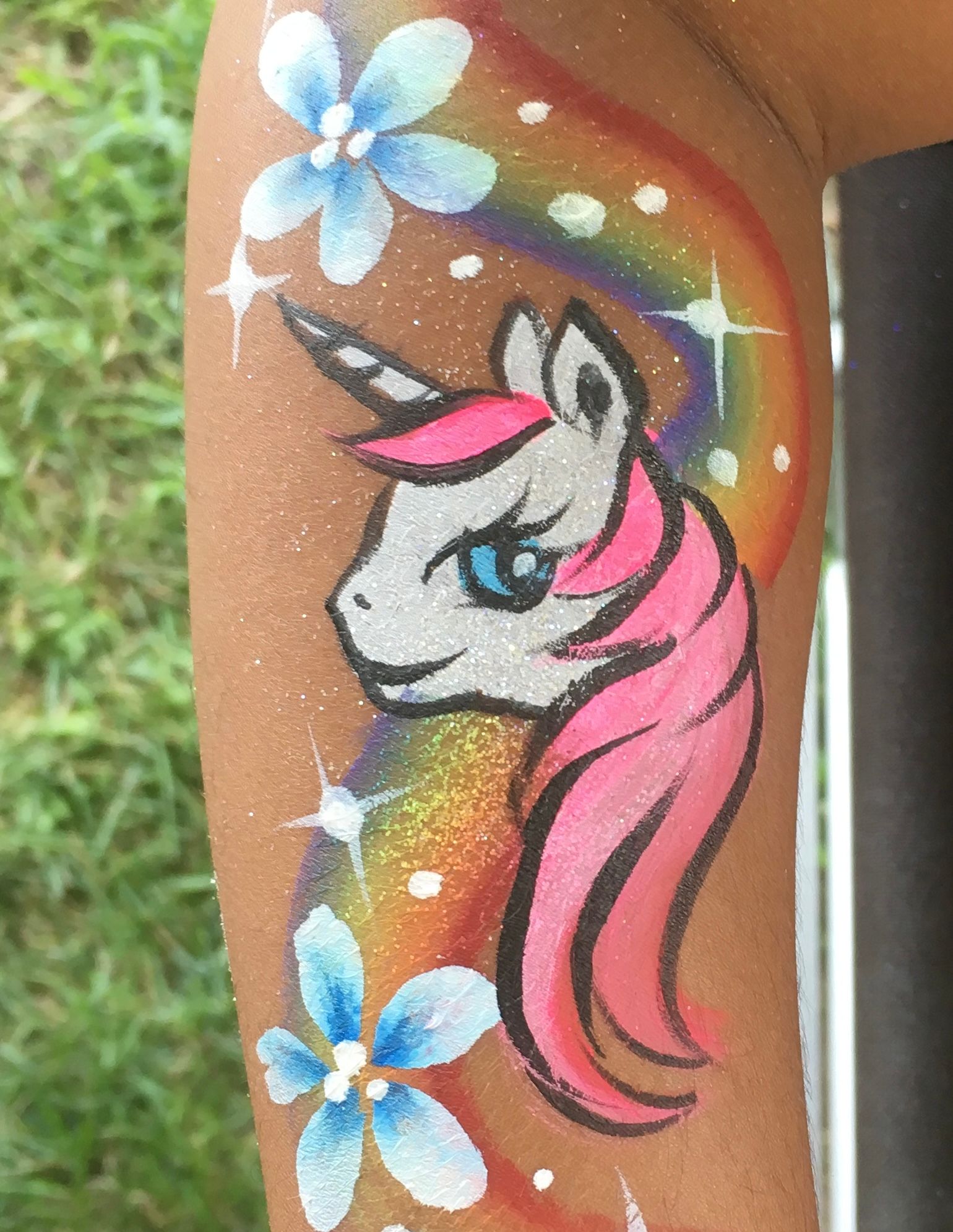 Unicorn on arm painting - Wheaton.jpg