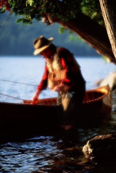 1MAN_STANDING_BY_CANOE_soft