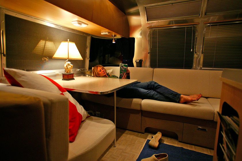 1Mom_reading_by_lamp_laying_down