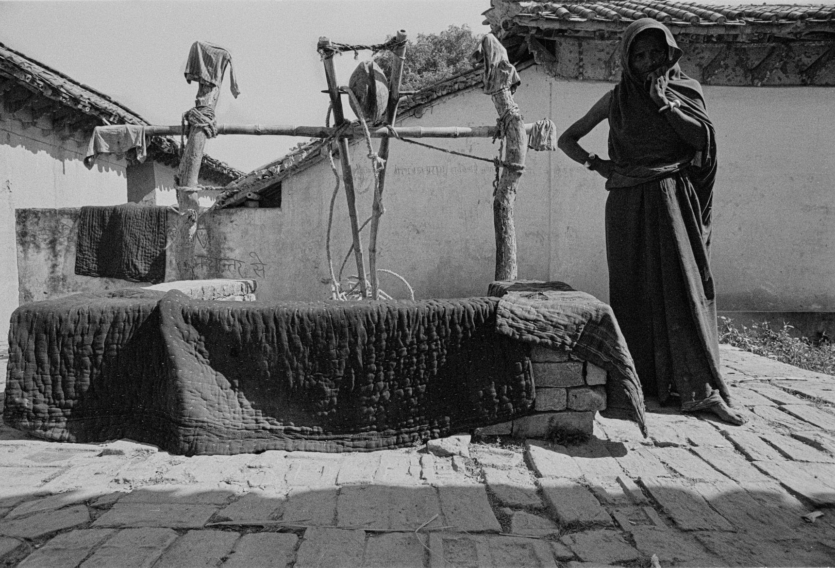 Portrait of rural Indian Village drying blankets