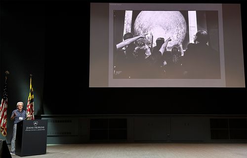 Michael Soluri speaking at JHU APL durng 10th anniv New Horizons Pluto flyby
