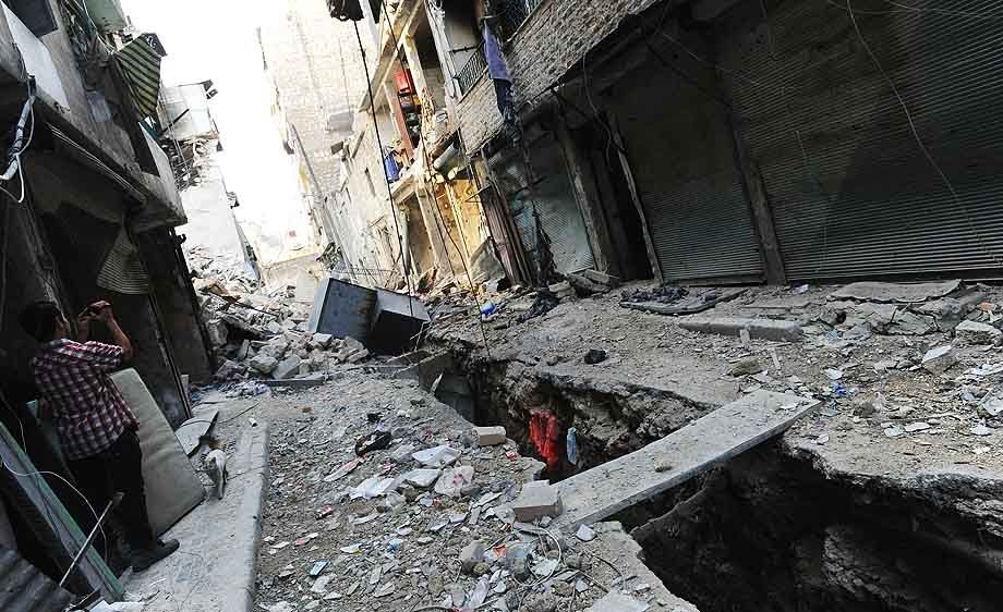 In battleground city of Aleppo, Syrians face destruction and continued conflict