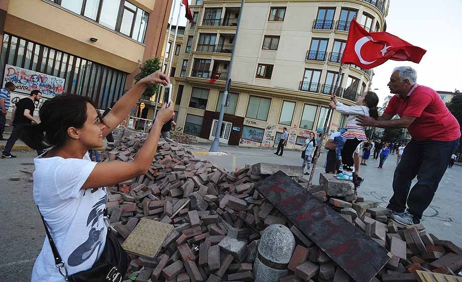 Turkish protesters celebrate in Taksim Square and at barricades