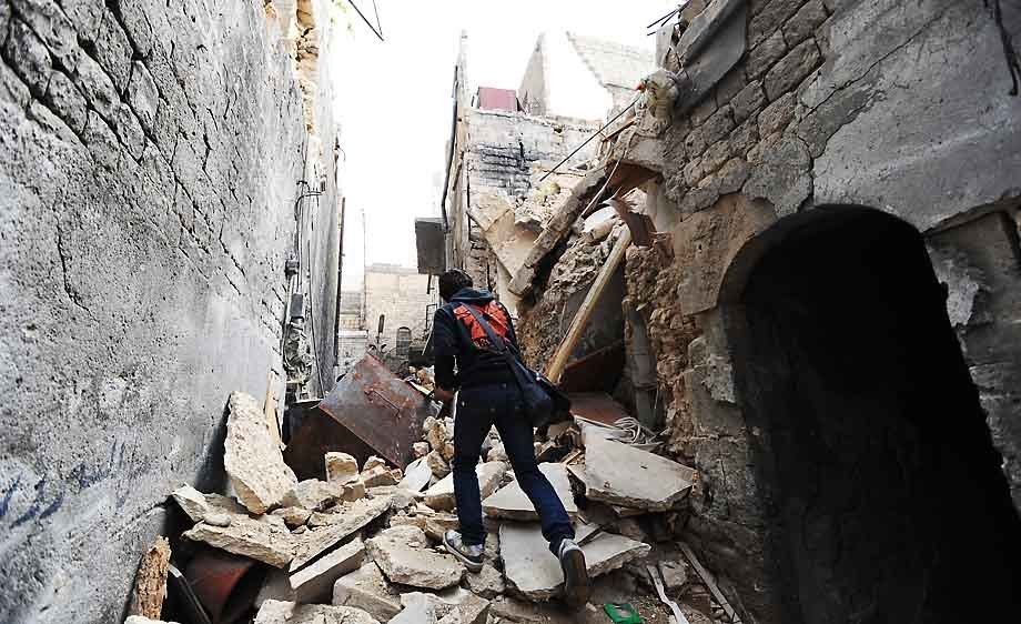 In battleground city of Aleppo, Syrians face destruction and continued conflict