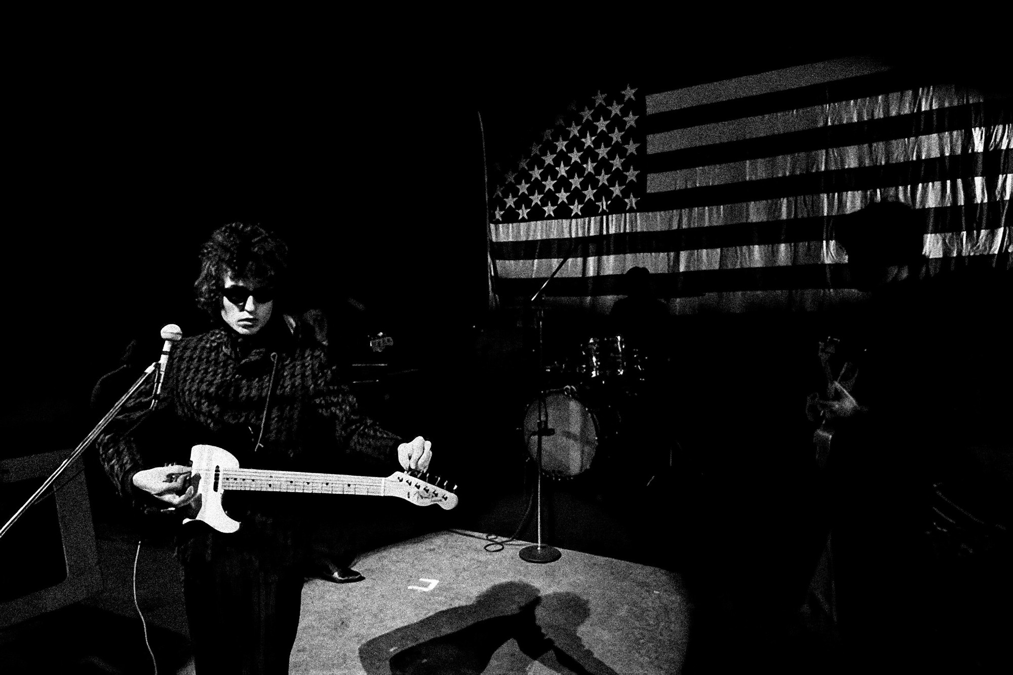 Bob Dylan performing in Paris, 1966. Photograph by Barry Feinstein 602-art-scale-6_00x-3.jpg