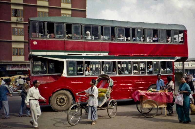 Double deckers and cycle rickshaw's Dhaka Bangladesh.