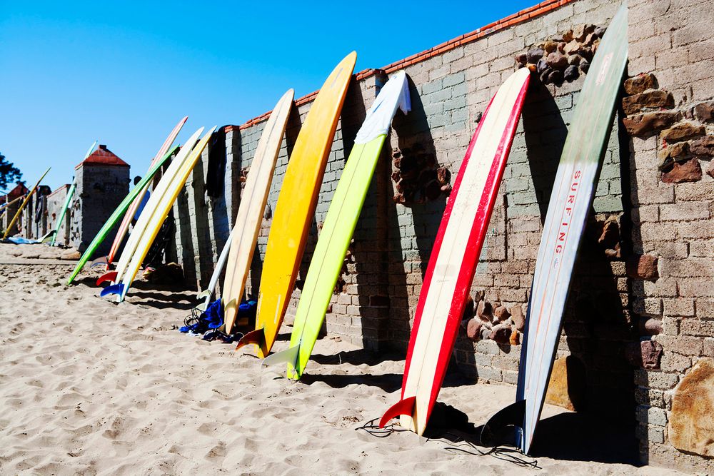 Surfboards, Surfing, Beach, Ocean, Surfrider Beach, Malibu, Summer Surfboards Against Wall at Surfrider Beach Malibu