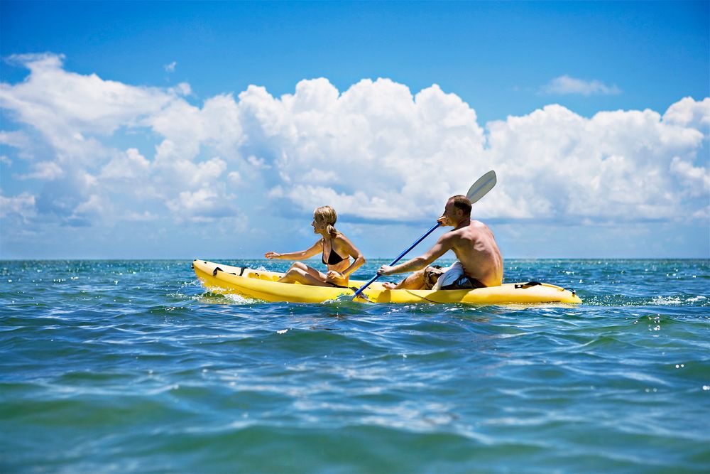 Kayaking, Ocean, Couple, Florida, Blue Sky, Summer, Fun, Adventure Couple Kayaking in Ocean