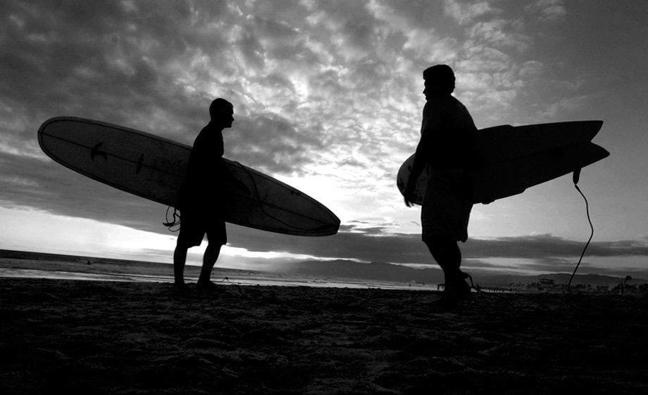 SURFERS AT SUNSET