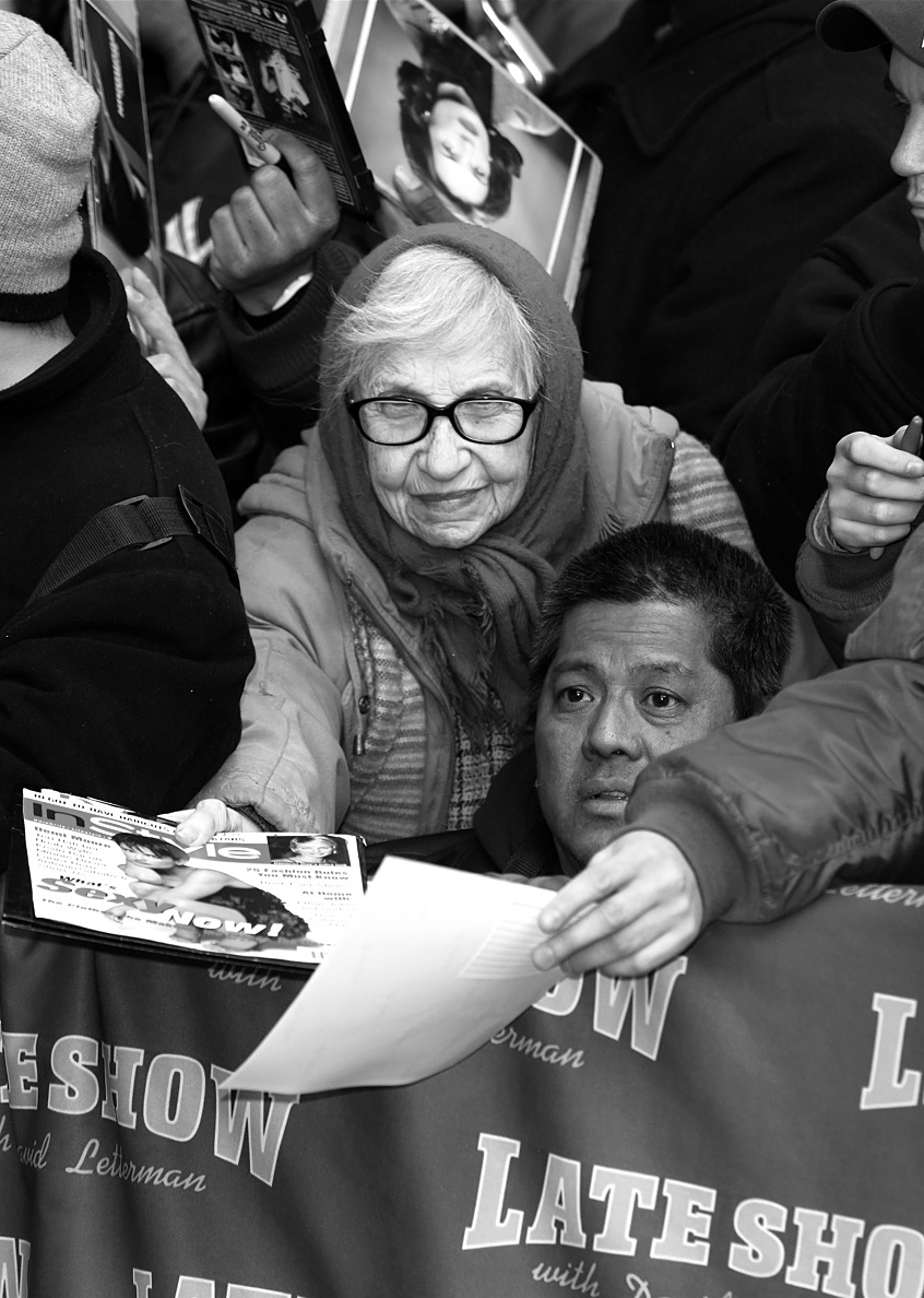 An older lady fan waiting patiently for and autograph from Demi More attending the David Letterman Show, New York. Fans of all ages