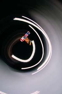 Ayumu Hirano.Aspen, CO. A spiral motion blur shot created on a Canon camera with a ProFoto B1 flash unit Ayumu Hirano catches air in halfpipe