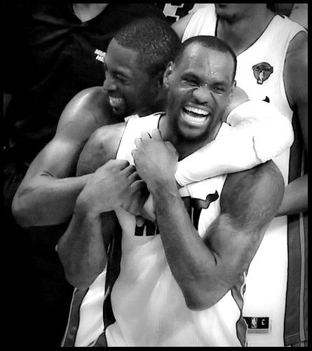 Dwyane Wade and LeBron James celebrate their NBA championship.