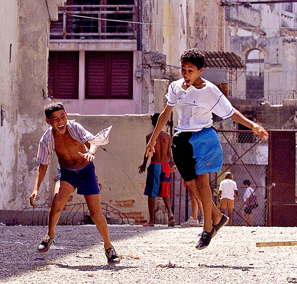 Kids celebrate a home run, Havana , Cuba