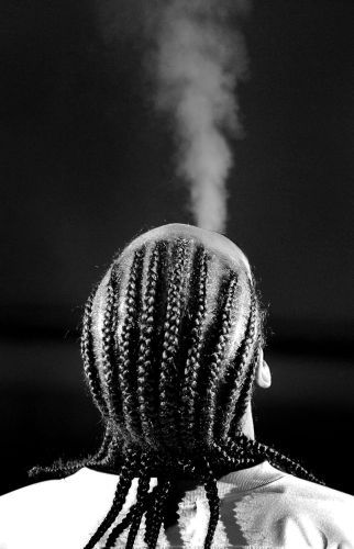 Snoop Dog exhales during his concert.
