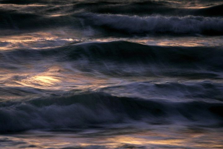 OCEAN at Dawn: magenta and black waves..