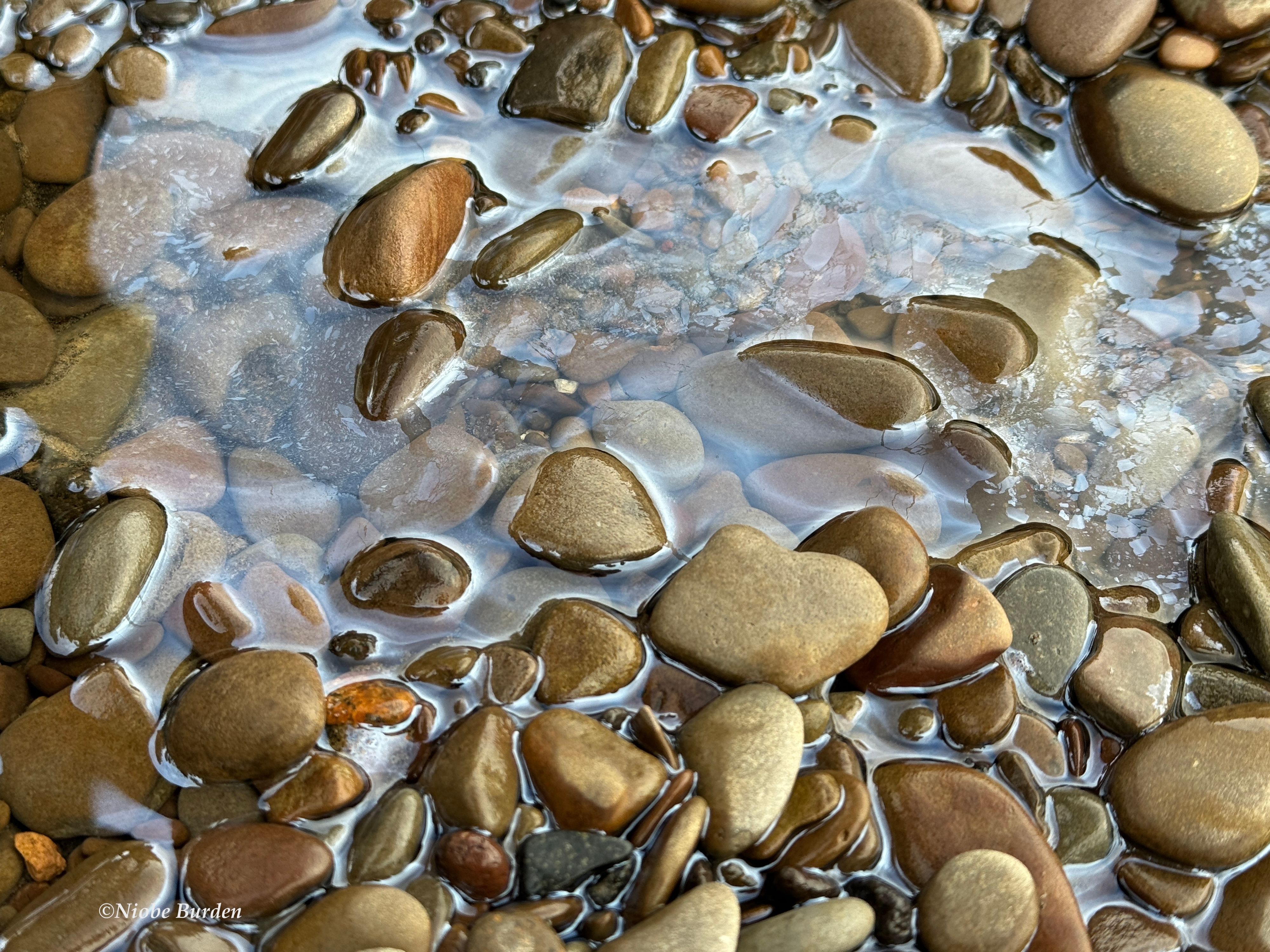 oil slick on rocks