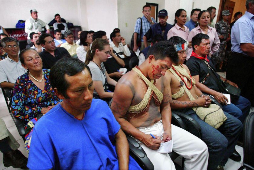 Indigenous leaders are joined by settlers, journalists and other interested parties on the first day of the trial against Chevron (formerly Texaco) in Lago Agrio on October 21, 2003.
