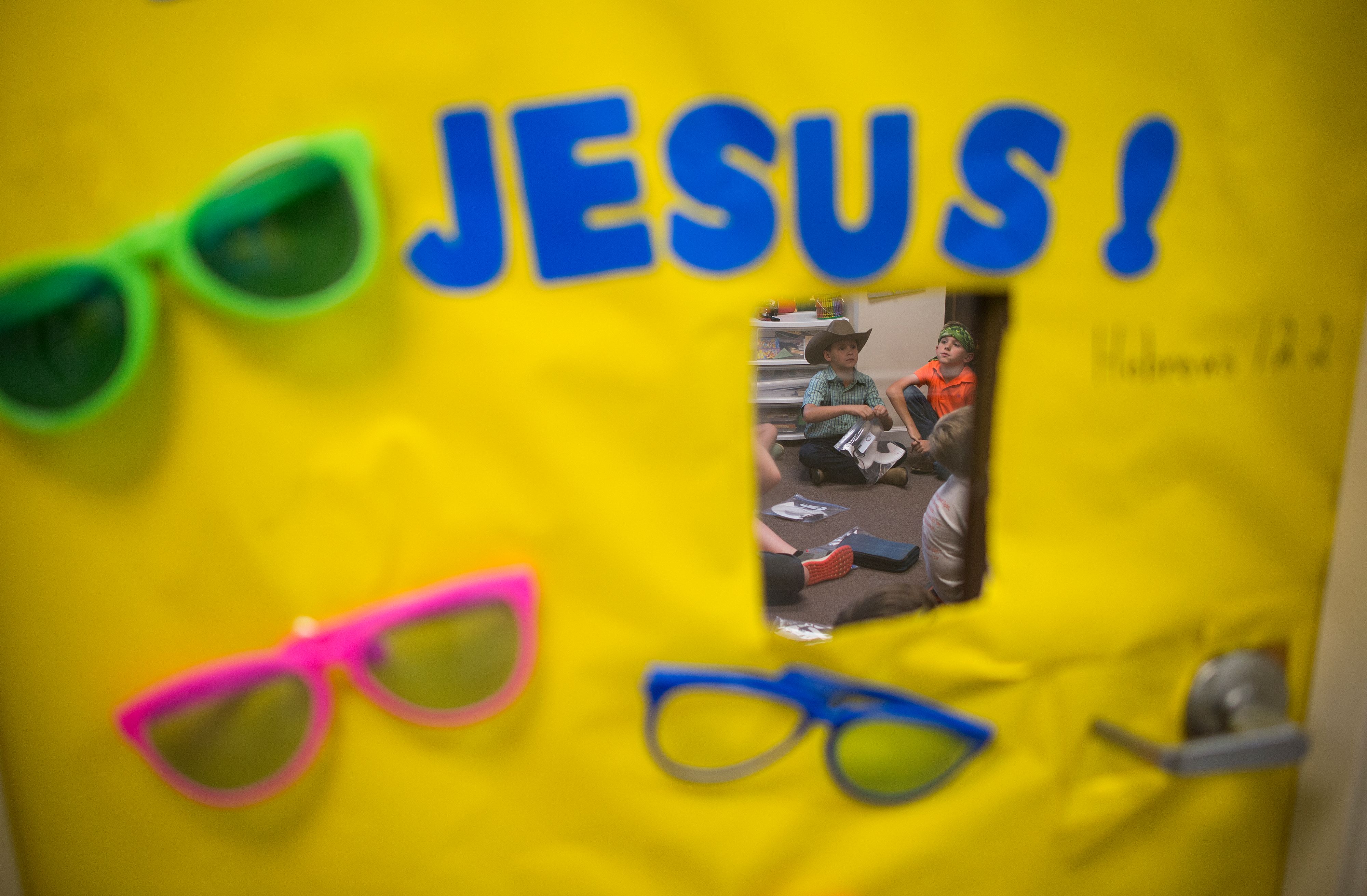 Children lissten during a class at the Mercedes Drive Church of Christ at a summer bible study in Vance, Alabama on June 7, 2017.