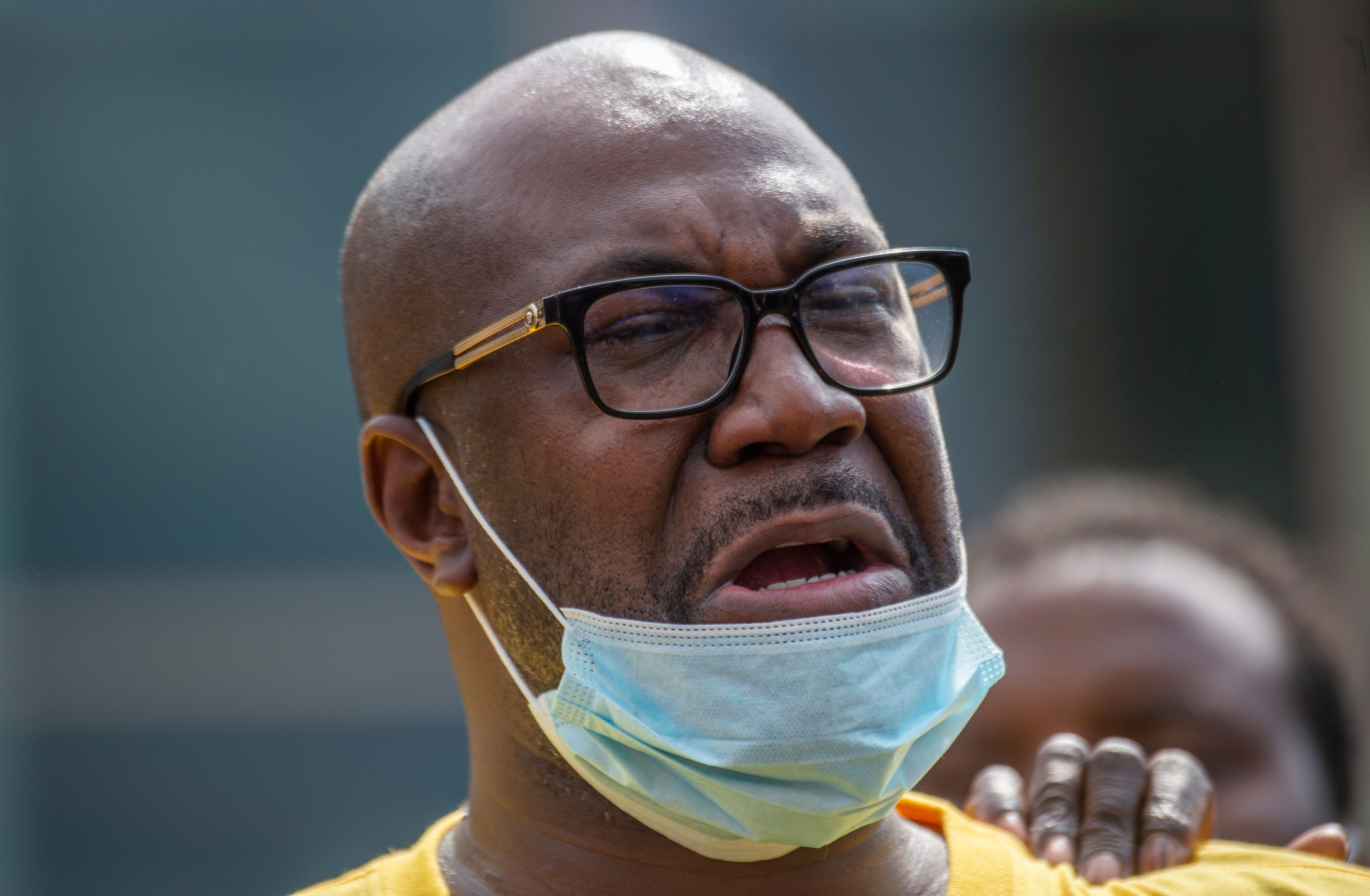 Philonise Floyd, George Floyd's brother, cries while speaking during a press conference outside the Fountain of Praise church. 1T40A0.jpg