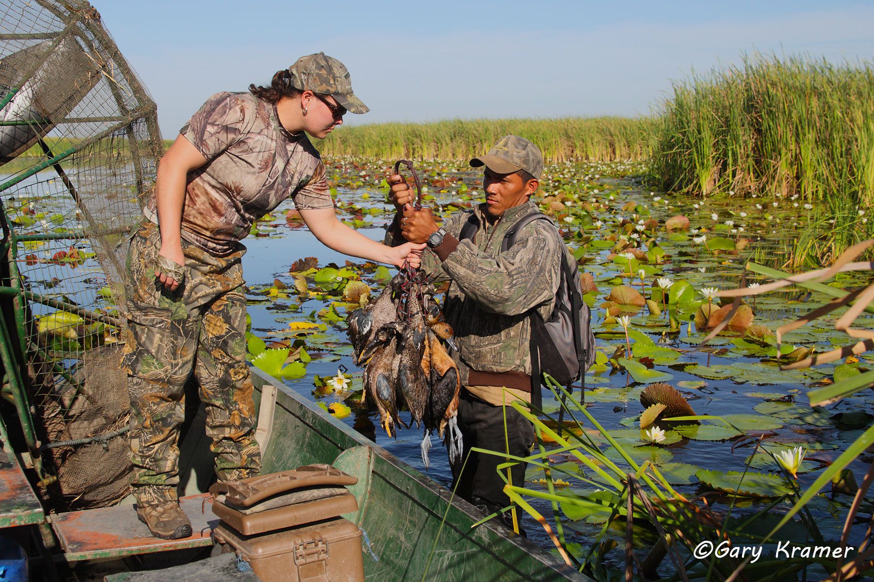 Hunter and guide with mixed bag of Ducks Hunter and guide with mixed bag of Ducks, Nicaragua - NHDmv#002d