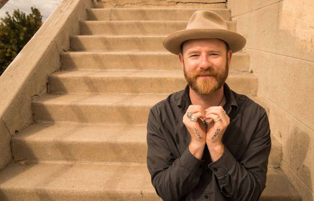 Corey Swartsel, LoveMore Ambassador, teacher, inspired arrow aimed toward social justice, engaged Buddhism, and compassion.