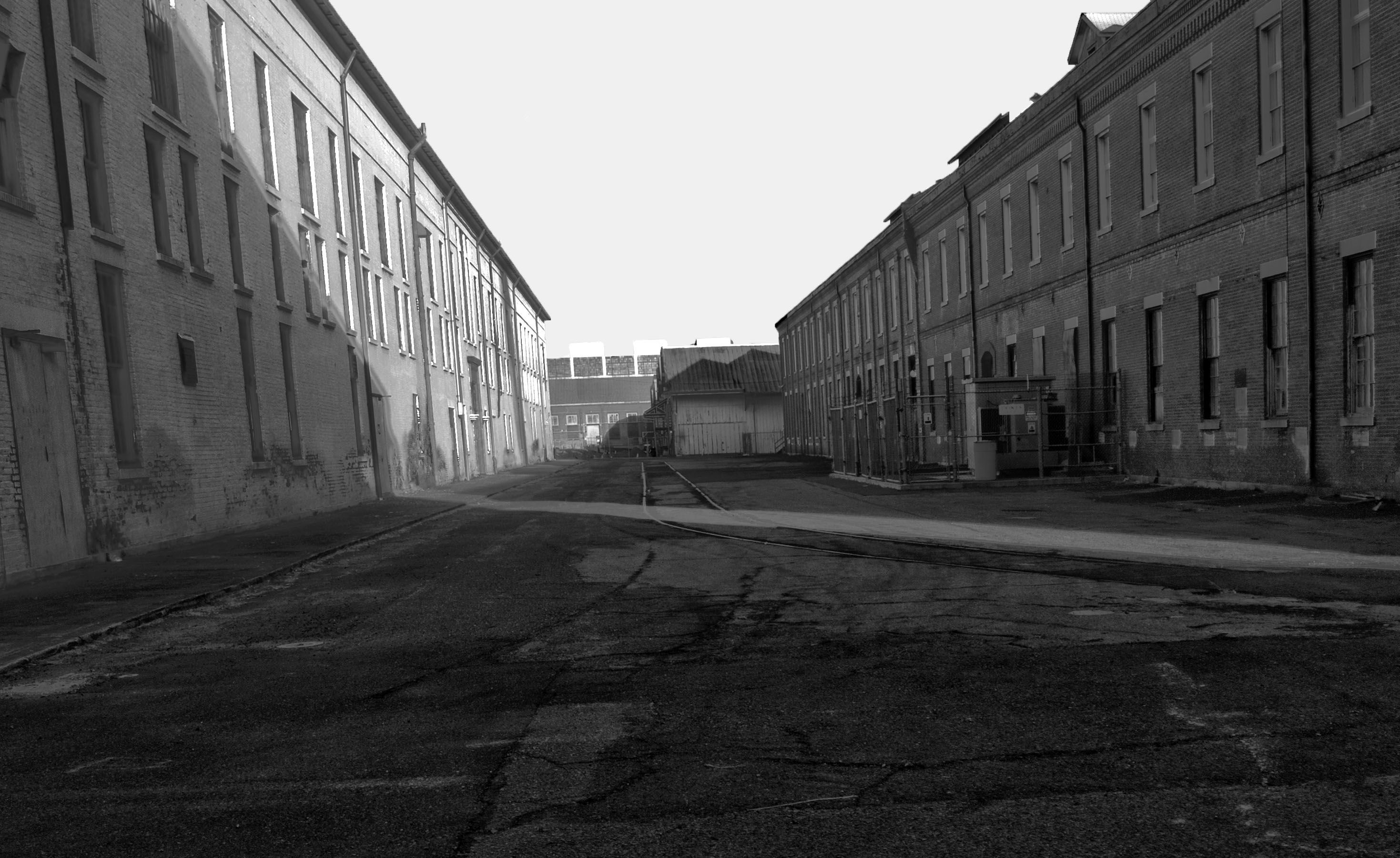 19th century buildings at Mare island with light casting a shadow. In Between