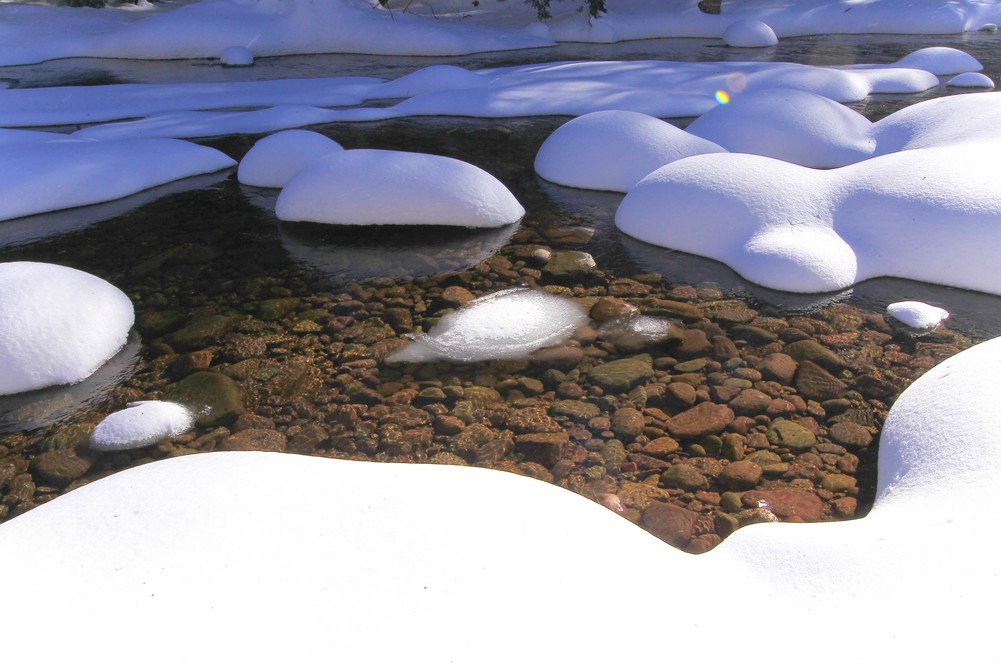 Boulders with snow and stream 3 2021.jpg
