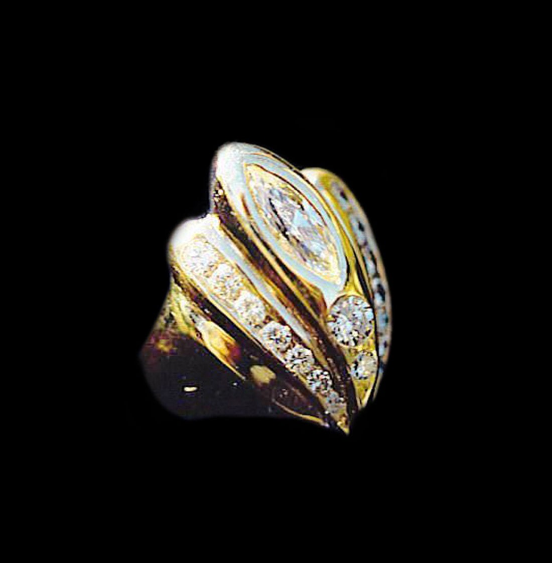 Assorted Diamonds set in 18 kt. yel. Gold