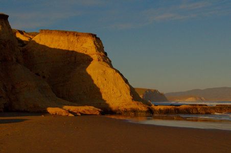 Curved Shadow On Cliffs, Drakes Beach, Point Reyes National Seashore, North Coast, California, 2011 by David Leland Hyde.